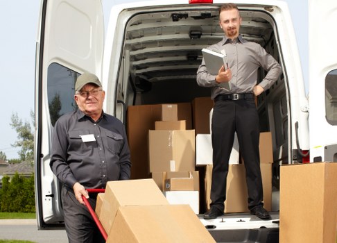 Professional movers planning a workplace move in Brixton