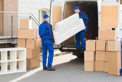 Careful loading of boxes and furniture for a Brixton apartment move