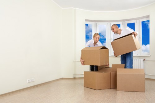 Team packing household items carefully in a Brixton home