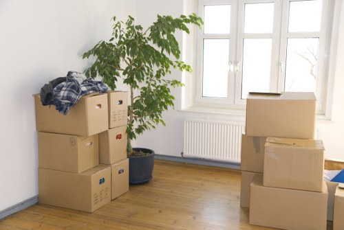 Removal van and moving team handling a home move in Brixton