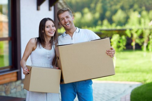 Packed moving boxes and furniture ready for transport by a UK removals company