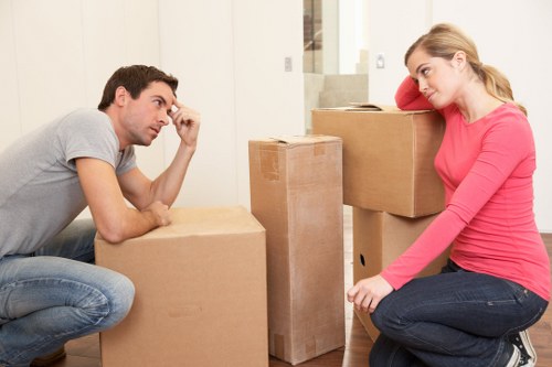 Packed moving boxes and dismantled furniture ready for flat removals