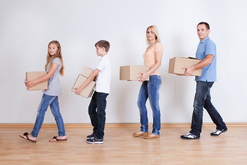 Careful loading of sofas and household furniture into a removal van