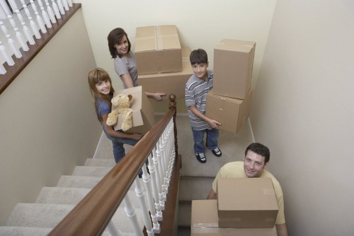 Careful loading of household items for removals in Brixton